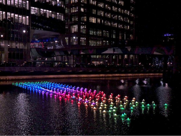 colorful-paper-boats-float-across-londons-canary-wharf-7